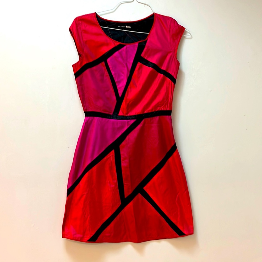 Fuchsia, coral and black geometric dress.